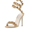Elyra Snake Rhinestone Sandals In Gold