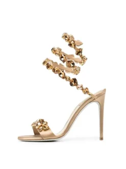 Elyra Snake Rhinestone Sandals In Gold