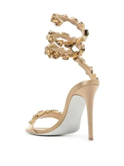 Elyra Snake Rhinestone Sandals In Gold