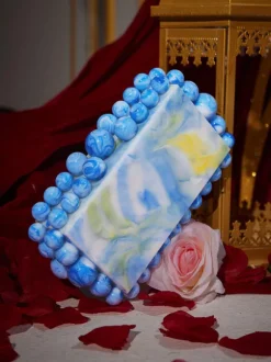 Sama Acrylic Beaded Clutch In Blue